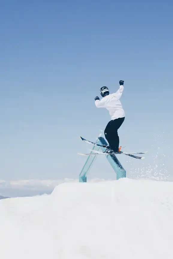 A skier performing a trick on a ski slope near Mont Tremblant cottage for sale