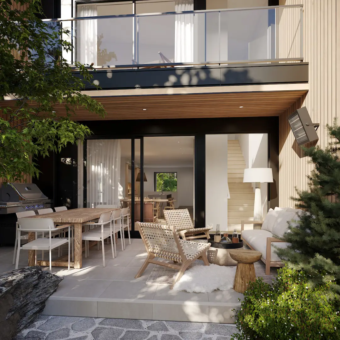 Vue extérieure en été des condos à vendre de L’Hymne des Trembles dans les Laurentides